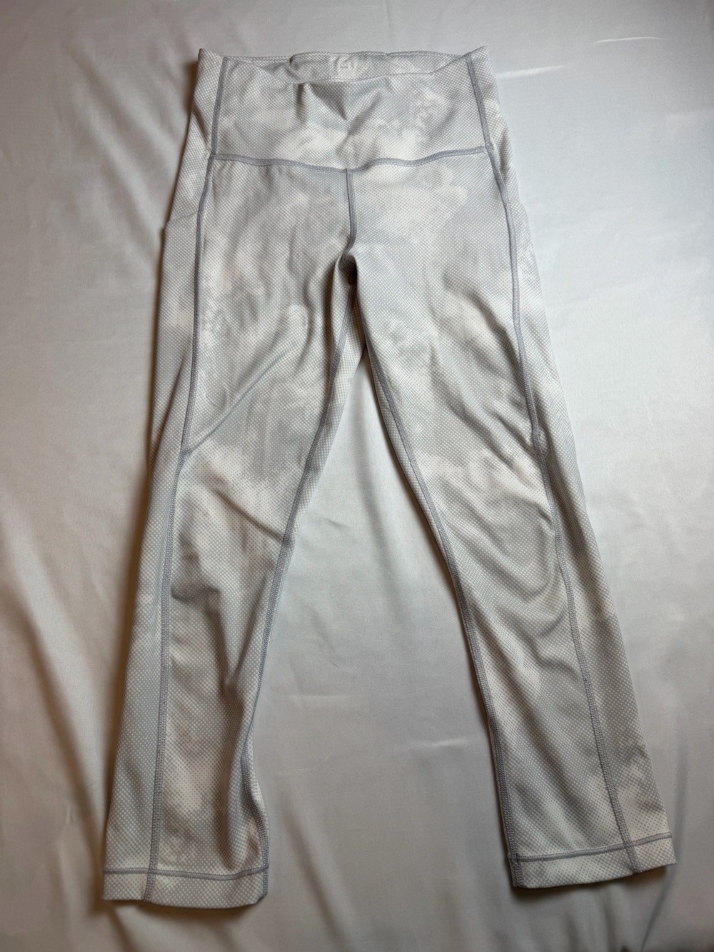 Athleta Light Gray and white leggings side and inside pockets size XS